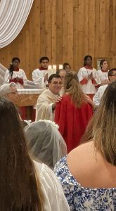 Alisha Hughes joins the church through OCIA.